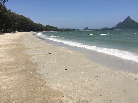 Ao Manao Beach has trees and deckchairs Ao Manao Beach has trees and deckchairs