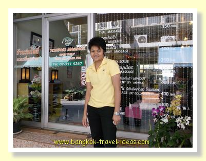 Masseur in Bangkok outside her shop in On Nuch Masseur in Bangkok outside her shop in On Nuch