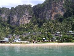 Centara Grand Resort and Villas viewed from the sea with the limestone cliffs in the background