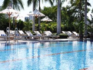 Swim in the pool at the Chatrium Riverside Bangkok