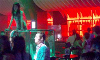 Club Insomnia go go dancer shaking her booty