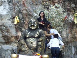 Can you see the Buddha image in the rock face? Can you see the Buddha image in the rock face?